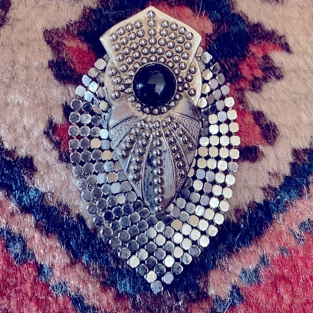 Vintage silver and onyx brooch